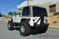 Zderzak tylny Rock Brawler z mocowaniem koła i szekli stalowy POISON SPYDER - Jeep Wrangler TJ - 5